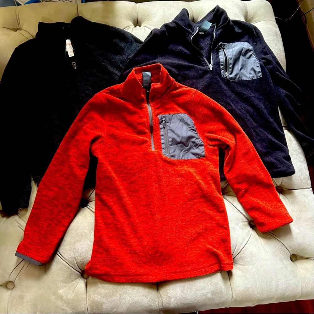 3 pullovers one orange and two black boys size medium 8/10.